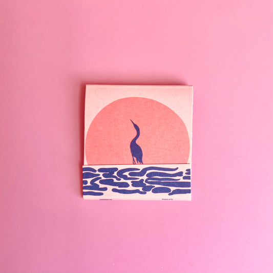Front of the Exotic Birds matchbook  featuring a blue heron