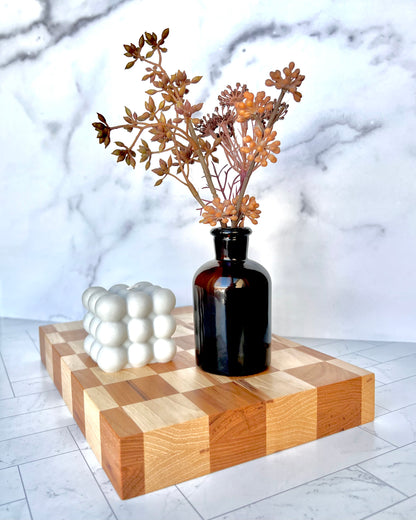 Checkered Cutting Board with small decorative objects set on top - Humble Abode