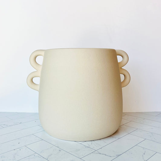 The Chiara White Vase set against a neutral white background