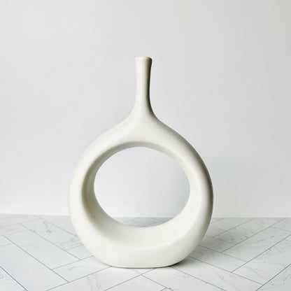 A white Vase shown against a white background