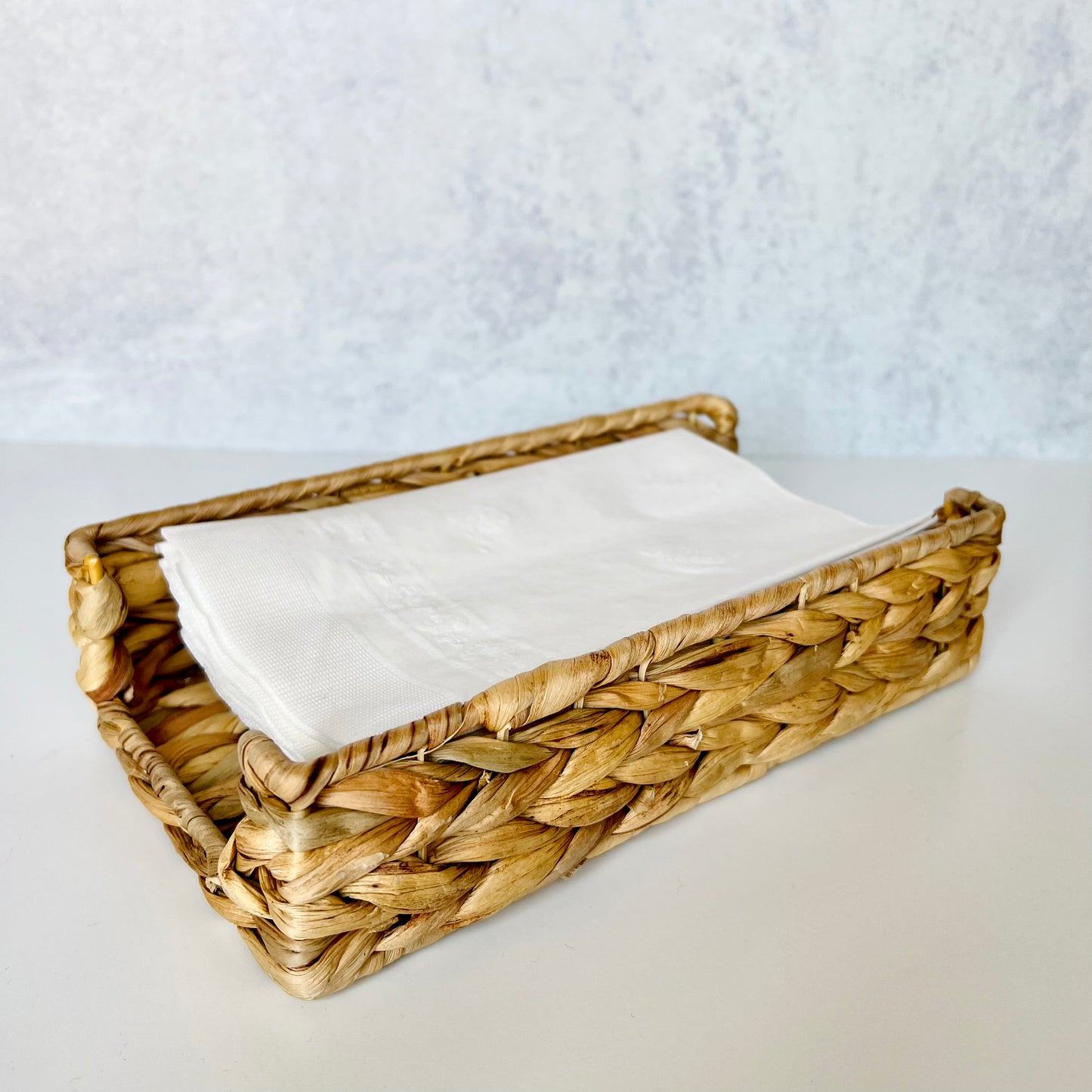The Hyacinth Napkin Holder filled with napkins - The Offbeat Co.