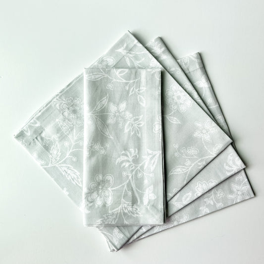The Gray Floral Napkins shown from above against a white background