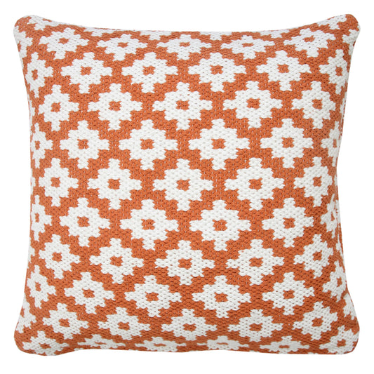 The geo-floral patterned throw pillow against a blank background