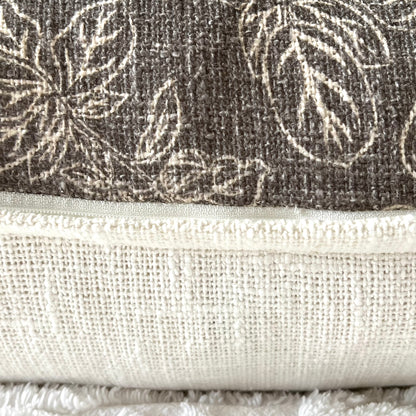 A close up of the zipper closure of the Emma Pillow Cover